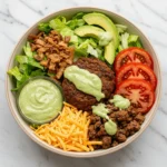 Delicious and customizable burger bowl with fresh toppings, protein, and healthy ingredients.